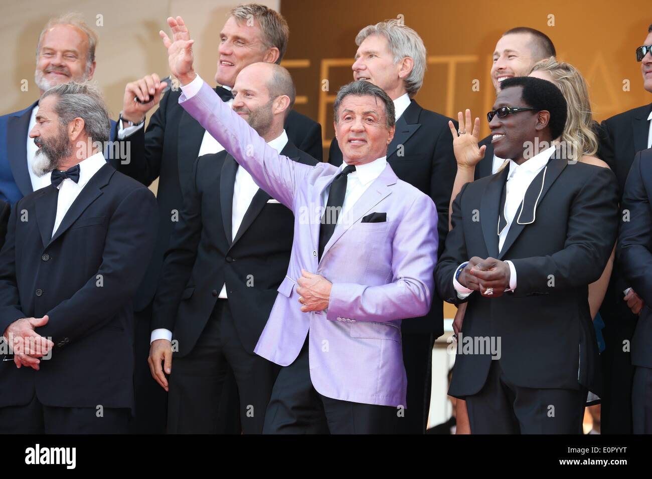 (Top l-r) Dolph Lundgren, Harrison Ford, director Patrick Hughes, actors Antonio Banderas, (front l-r) Mel Gibson, Jason Statham, Sylvester Stallone, Ronda Rousey and Wesley Snipes attend the premiere of 'Expandables 3 during the 67th Cannes International Film Festival at Palais des Festivals in Cannes, France, on 18 May 2014. Photo: Hubert Boesl NO WIRE SERVICE Stock Photo
