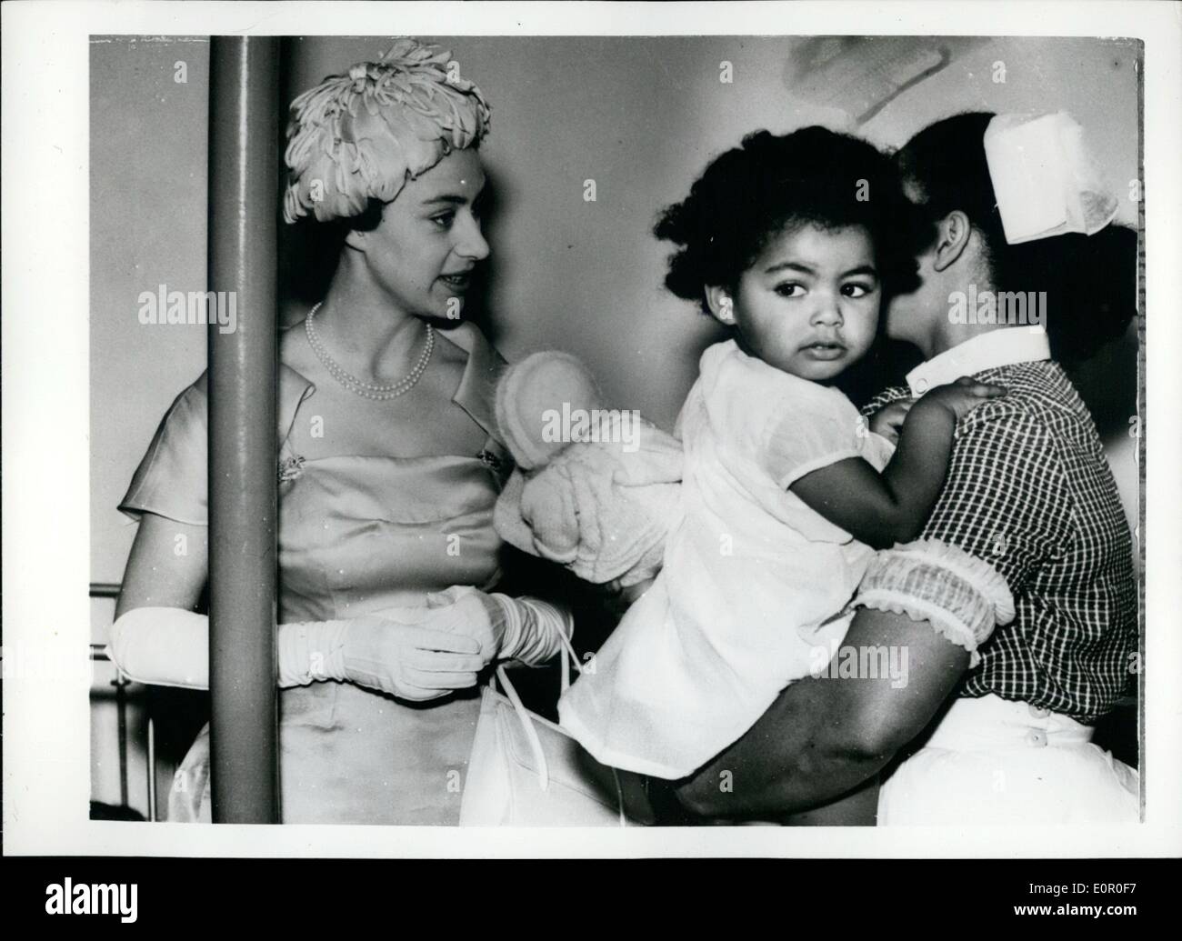 Jun. 06, 1957 - Princess Margaret Opens New Hostel for West Indian Women at Camber well : Princess Margaret went to Adding-ton-square,Camber well,South East London this afternoon to open a new hostel for West Indian women and their Children. The hostel consists of two large houses which have been converted and furnished at a cost of &pound;7,000 under the Talbot Settlement Scheme. The Talbot Settlement -founded in 1900 for Women's Social Work -Will run the hostel, which includes Small bedrooms a dormitory With Cubicles, Kitchens, office sand a first-aid Post Stock Photo