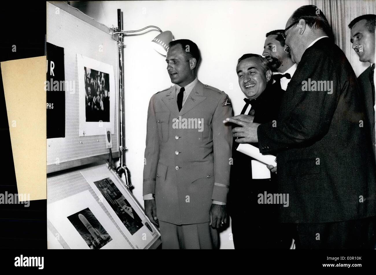 Aug. 08, 1957 - Enthusiastic photo-amateurs of the US Army: have exhibition their pictures on August 24th and 25th 1957 in Berchtesgaden, where they will be awarded a prize by an expert jury. Photo Shows Left to right: 1st Lieutenant W. Gyetan (Frank W. Gyetan) (Co E, 11th, Armd Cav Regt Southern Area Command) who received the 1st prize for his black-and-white photograph ''Star and Satellites''. Members of the jury were Mr. Jacob Deschin, picture-editor of the New York Times; Director Fritz Gruber of the ''Photokina'' and Dr. Otto Croy, Chief-editor of the ''Photo-Magazine' Stock Photo