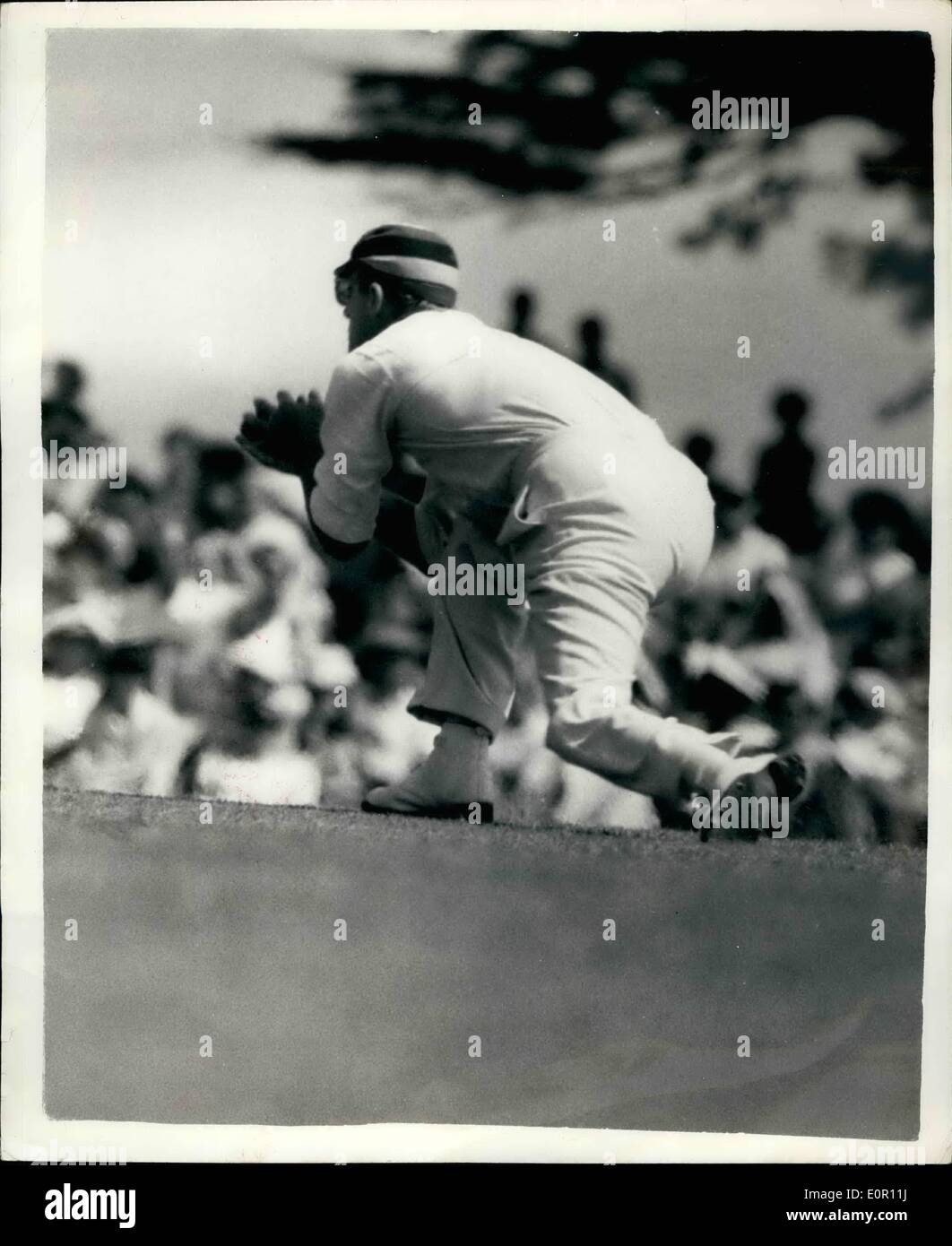 Aug. 08, 1957 - The Duke of Edinburgh plays Cricket.: H.R.H. The Duke of Edinburgh played cricket yesterday afternoon when he captained a side against the Duke of Norfilk's Xi in the grounds of Arundal Castle. Photo shows the Duke shapes for a catch, it was a ''sitter''from the Duke of Norfolk, but the Duke of Edinburgh dropped it. Stock Photo