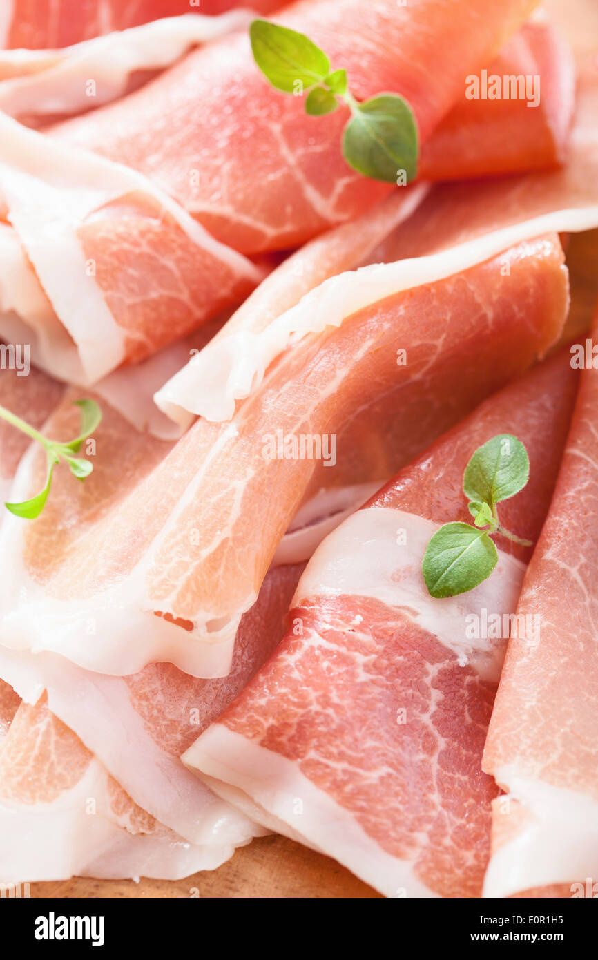 sliced prosciutto ham closeup Stock Photo