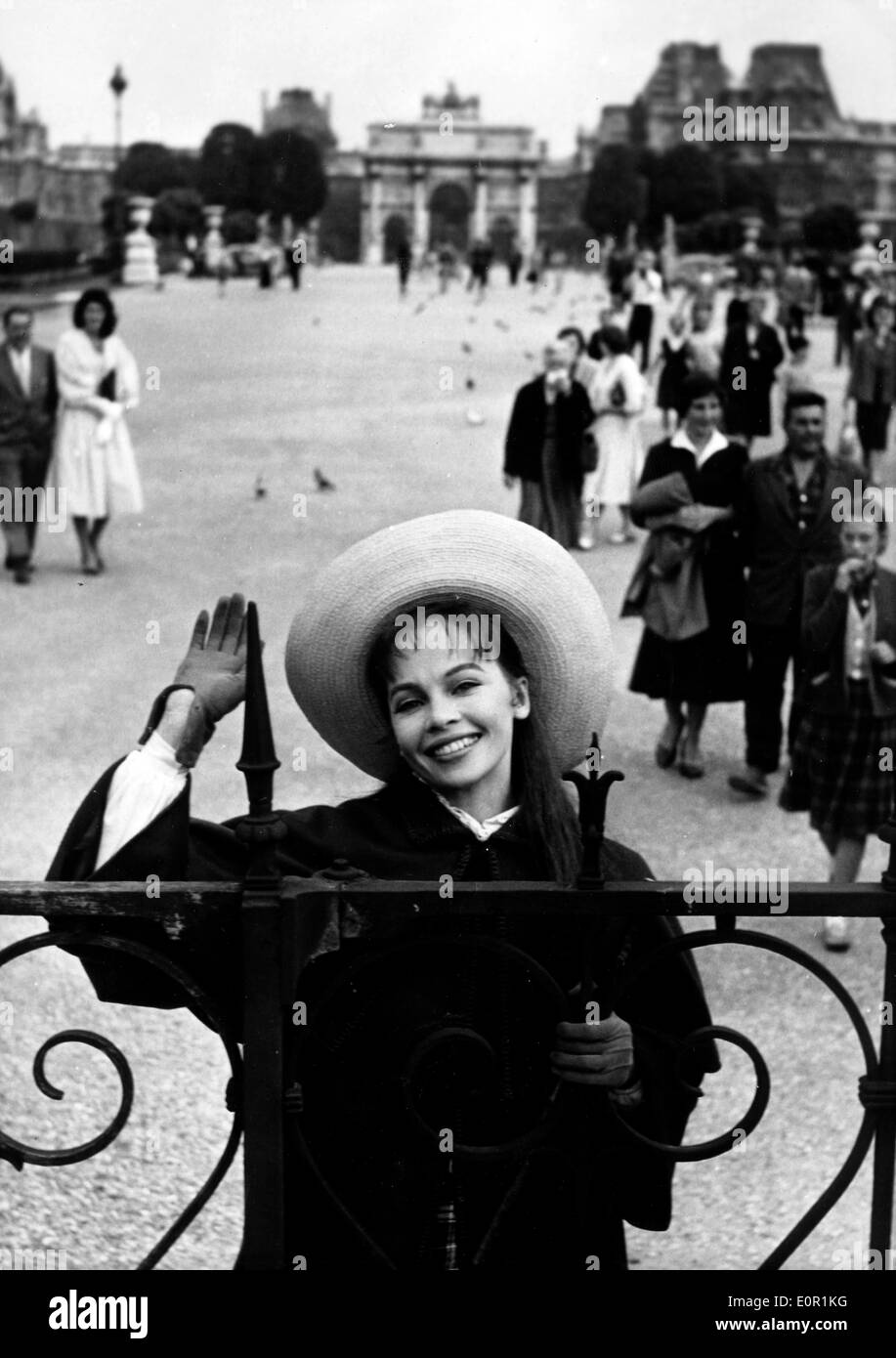 Actress Leslie Caron waving goodbye to Paris Stock Photo