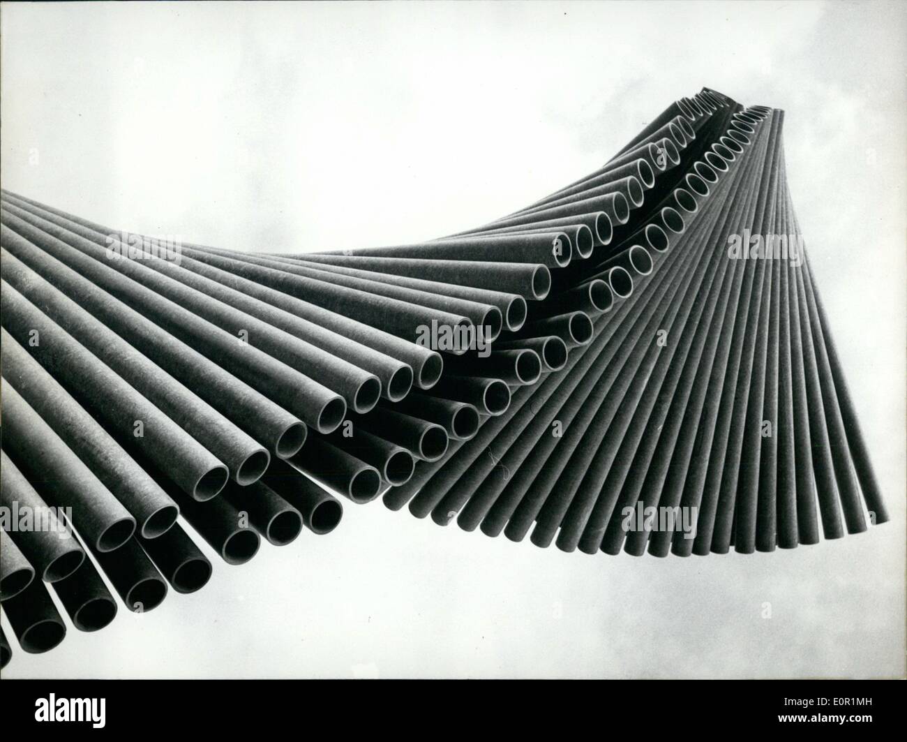 Sep. 09, 1957 - Architectonic Play with pipes.: The Berlin Magicians of the International Industrial Exhibition transform even such prosaic building-material ''Eternit'' - a mixture of asbestos and concrete - into an elegant structure. Stock Photo