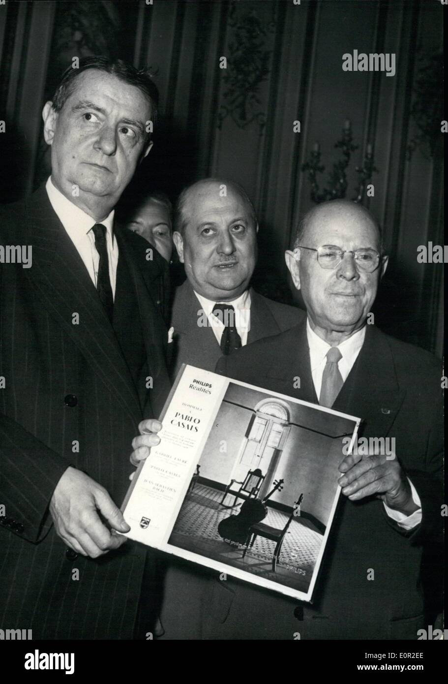Oct. 10, 1957 - Pablo Casals presented with his best record,: Pablo Casals, the famous Cellist, was presented with the record of the rehearsal of his 80th birthday concert at a ceremony held at Musee Jacquemart -Andre, Paris today. Photo shows Pablo Casals receives the record from Georges Auric, the famous composer Stock Photo