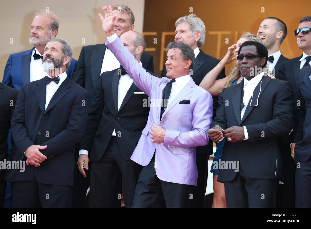 (Top l-r) Dolph Lundgren, Harrison Ford, director Patrick Hughes, actors Antonio Banderas, (front l-r) Mel Gibson, Jason Statham, Sylvester Stallone, Ronda Rousey and Wesley Snipes attend the premiere of 'Expandables 3' during the 67th Cannes International Film Festival at Palais des Festivals in Cannes, France, on 18 May 2014. Photo: Hubert Boesl NO WIRE SERVICE Stock Photo