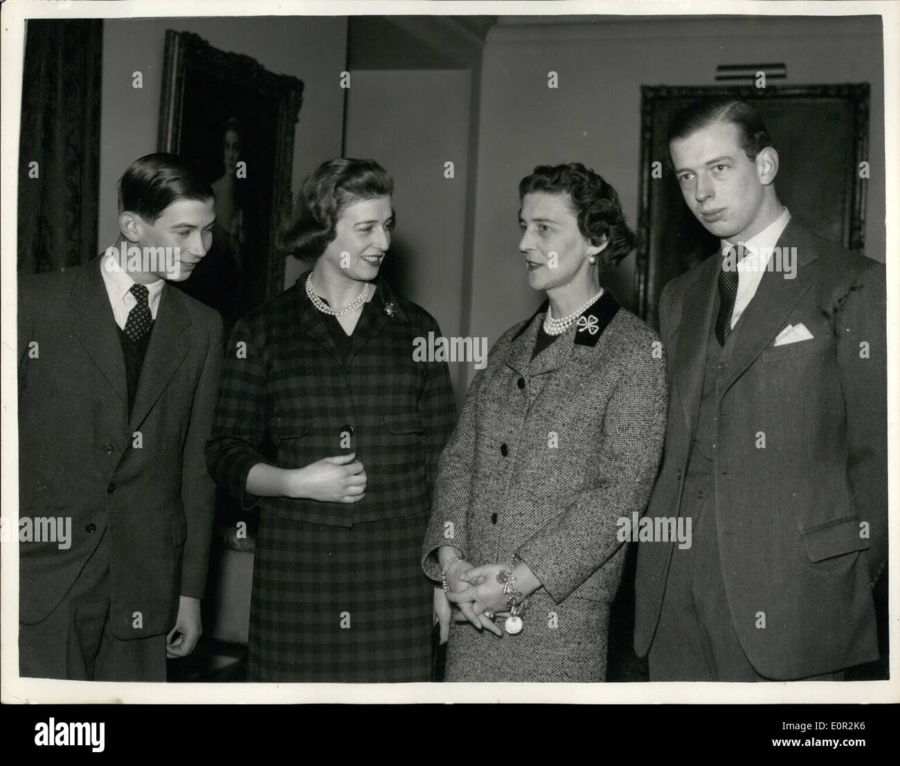 Dec. 12, 1957 - Princess Alexandra 21 On Christmas Day.: Princess Alexandra Of Kent Is Shown With Her Mother, The Duchess Of Kent, And Her Brothers. The Duke Of Kent (Right), 22, And Prince Michael, 15, At Kensington Palace, London, Yesterday (Dec. 18th). The Picture Was Made In Convection With The Princess' 21st. Birthday, Which She Celebrates On December 25. Stock Photo