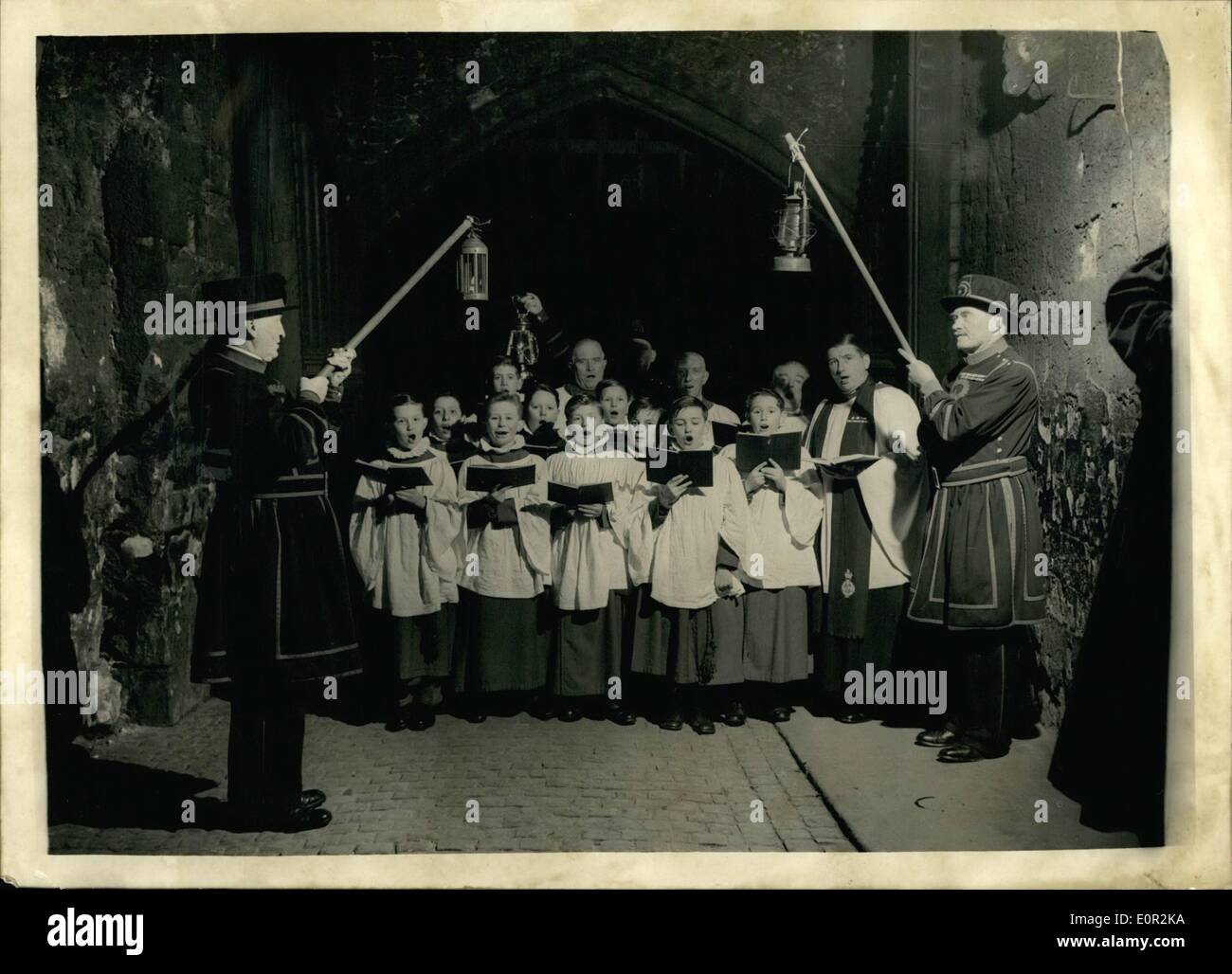Dec. 12, 1957 - Carols in the Tower of London. Keystone Photo Shows: Yeoman Warders hold lanterns, as choristers of the Chapel Royal of St. Peter ad Vincula, in the Tower of London, sing during their annual round of carols. Stock Photo