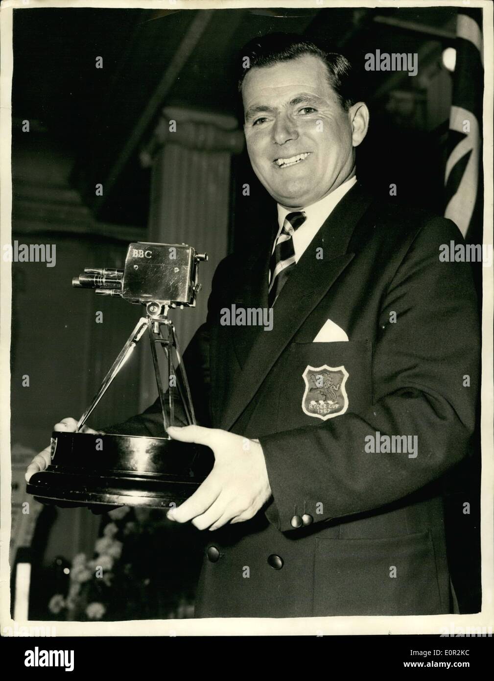 Dec. 12, 1957 - Dai Rees acclaimed B.B.C. ''Sports view personality'' of the year.: Last night millions of TV viewers saw Dai Rees, the golfer, was acclaimed the B.B.C. ''Sportsview Personality of the Year'' in one of the greatest-ever sports parades assembled at the Grosvenor House. Photo shows Dai Rees pictured with his trophy after the presentation last night. Stock Photo