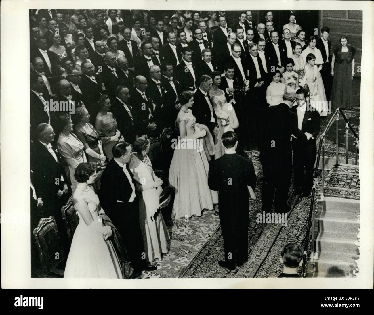 Dec. 12, 1957 - Nobel Prize Germany. The Nobel Prize winners received their awards from King Gustav of Sweden, at the Concert Hall in Stockholm. The ceremony was followed by the traditional banquet in the Town Hall. Keystone Photo Shows:- King Gustav seen on right presenting Professor Tsung Dao Lee, who shared the Nobel Prize for Physics with Professor Chen Ning Yang (seen in foreground, back to camera), with his award. Prof. Ning Yang had just received his. Looking on, in first row, are: Princess Birgitta; Prince Bertil, Queen Louise, Princess Margaretha, Prince Wilhelm and Princess Desiree. Stock Photo