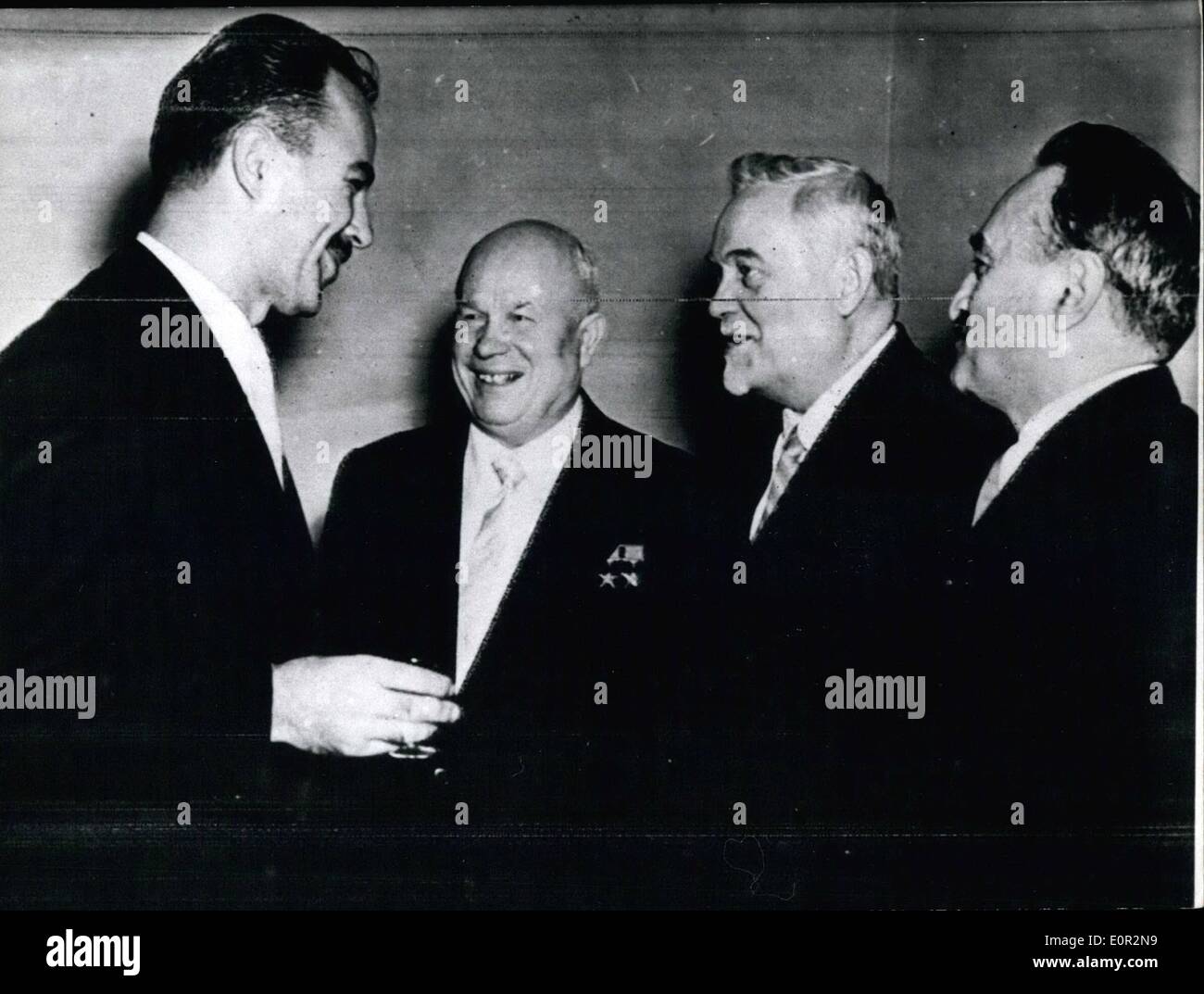 Dec. 12, 1957 - With a winning smile greeted leading Soviet statesman, Chrustochov, Bulganin and Mikojan the Yugoslavian Ambassador to the Soviet Union, Velko Mikunovic, who gave a reception on the occasion of the 12th anniversary of the People's Republic if Yugoslavia. Photo shows left to right: Velko Mikunovic, Chrustchov, Bulganin and Mikojan during the reception. Stock Photo