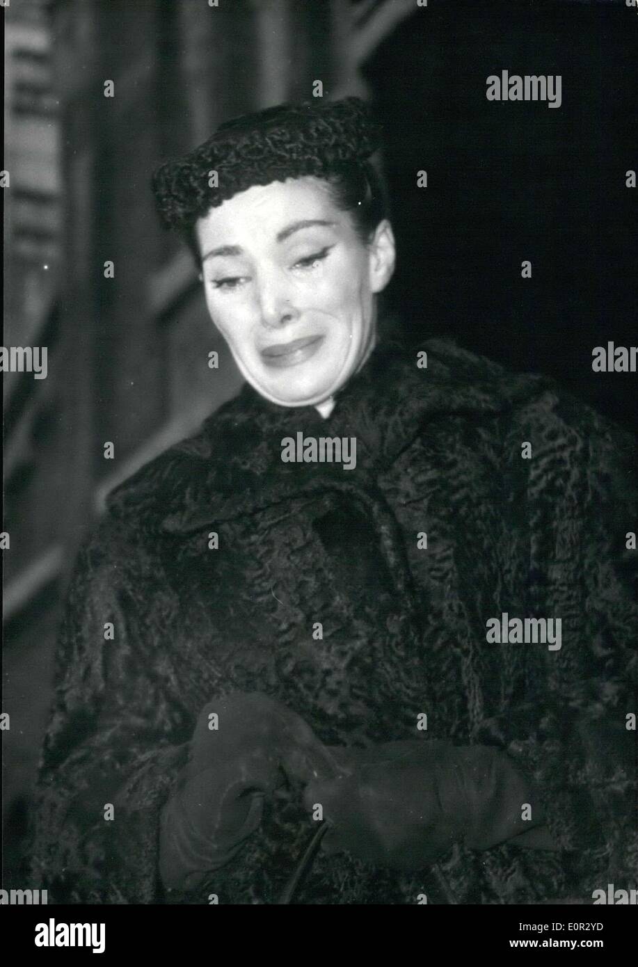 Oct. 29, 1957 - Lucky, Christian Dior's favorite model, enters the St-Honore-D'Eylau Church, where Dior's funeral service is being held. Stock Photo