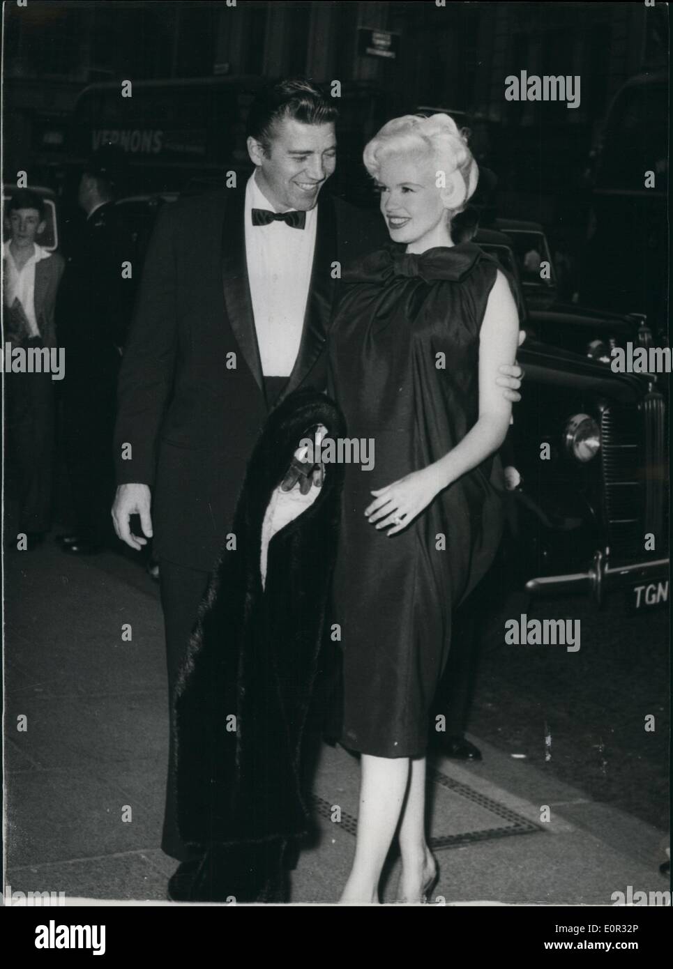 Dec. 00, 1958 - ''(Illegible)'' Mansfield Attends Premiere. s Expecting A Baby: Photo shows Jayne Mansfield, pictured with her Haymarket last night, attend the premiere of the film ''The Battle of the v.l.'' Jayne, who wore a sack-style dress, yesterday announced that she is expecting a baby in December. Stock Photo