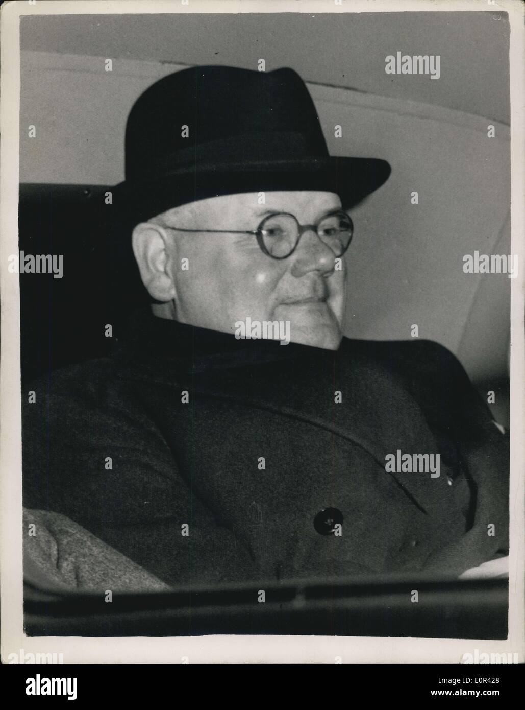 Nov. 27, 1957 - Dr. John Bodkin Adams appears before general medical council disciplinary committee.. To be ''Struck off Register'' : Dr. John Bodkin Adams (58) of Eastbourne today faced the discoplinary committee of the Grand Medical Council in London - because of his conviction last July at Lewes Assises on charges relating to National Health prescriptions - cremation certificates and other matters.. He was then fined a total of ?2,400. Photo shows Dr. John Bodkin Adams seated in his car - as he left after the hearing today at which he was ordered to be ''struck off the register' Stock Photo