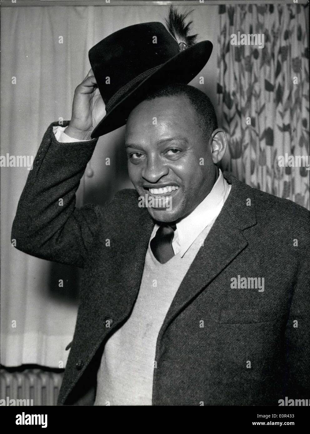Jan. 08, 1958 - ''Gruss Gott'', said Lionel Hampton. Presenting his true Bavarian hat, he bought in Munich. Lionel Hampton was playing with his Jazz-band at Jan. 7,1958 in the Dutch Museum in front of a sold out theater. Hampton lately got the doctor title from the Allen - University. South-Carolina. Photo shows Lionel Hampton. Stock Photo