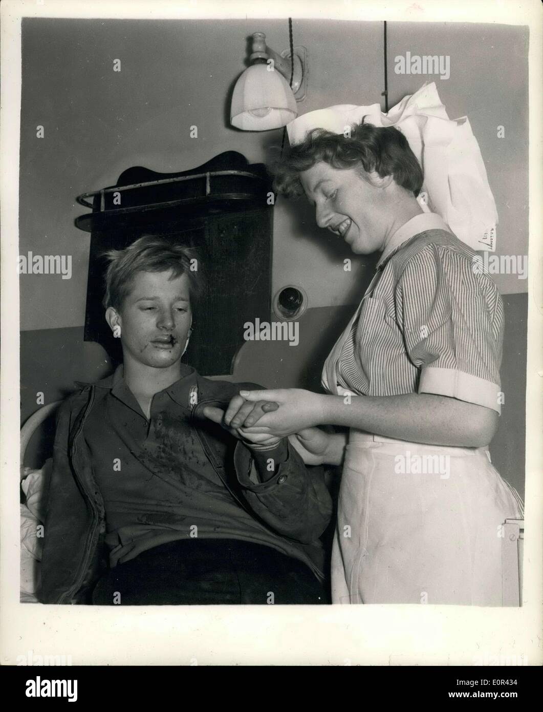 Jan. 08, 1958 - Ted Ray's Son Hurt In Car Crash.. Receives Hospital Treatment. Andrew Ray the 18 year old son of comedian Ted Ray was taken to hospital yesterday with face and head cut after his car had been in collision with a lorry - in Holloway, North London.. Keystone Photo Shows:- Andrew Ray at the hospital - where he was treated for his injuries yesterday. Stock Photo