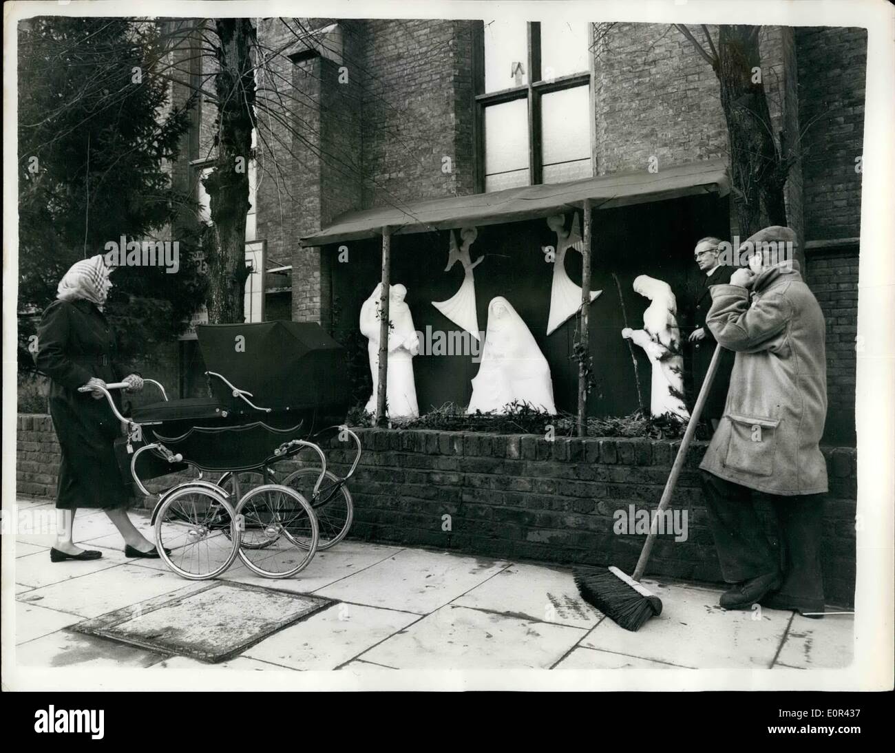 Jan. 09, 1958 - 9-1-58 Admiration for the VicarÃ¢â‚¬â„¢s work Ã¢â‚¬â€œ The striking Nativity scene outside Holy Trinity Church, Stock Photo