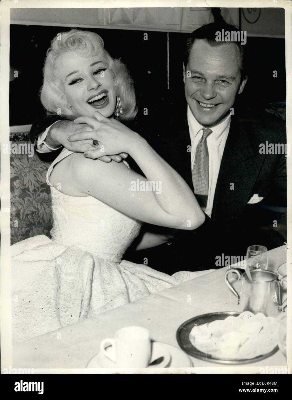 Dec. 09, 1957 - 9-12-57 The Prince and the showgirl. Sabrina and Prince Christian of Hanover. Popular showgirl Sabrina appears to be having plenty of fun with Prince Christian of Hanover over diner at the Colony Restaurant, London. It is said that the Prince planned to escort Sabrina to the Variety Artistes Ladies' Ball at the Dorchester Hotel but he is unable to do so as he is still in mourning of Prince George of Greece. Stock Photo