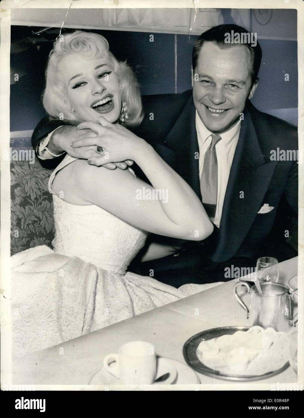 Dec. 09, 1957 - The Prince And The Show Girl Sabrina And Prince Christine Of Honover: Popular show girl Sabrina appears to having plenty of fun with Prince Christian of Hanover dinner at the Colony Restaurant, London. It is said that the Prince, planed to escort Sabrina to the Variety Artists Ladies Ball at the Dorchester Hotel - but he is unable to do as he is still in morning for Prince George of Greece. Stock Photo