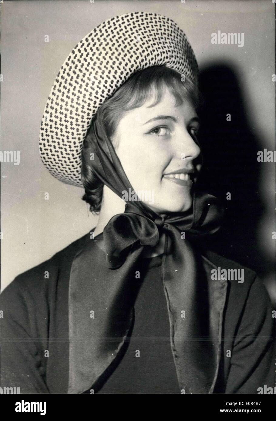 Jan. 30, 1958 - Spring and Summer Fashions: Jane Blanchot, Paris Milliner, is now shoing her spring and summer collections. White Laize hat with scarf tied up under the chin. Stock Photo