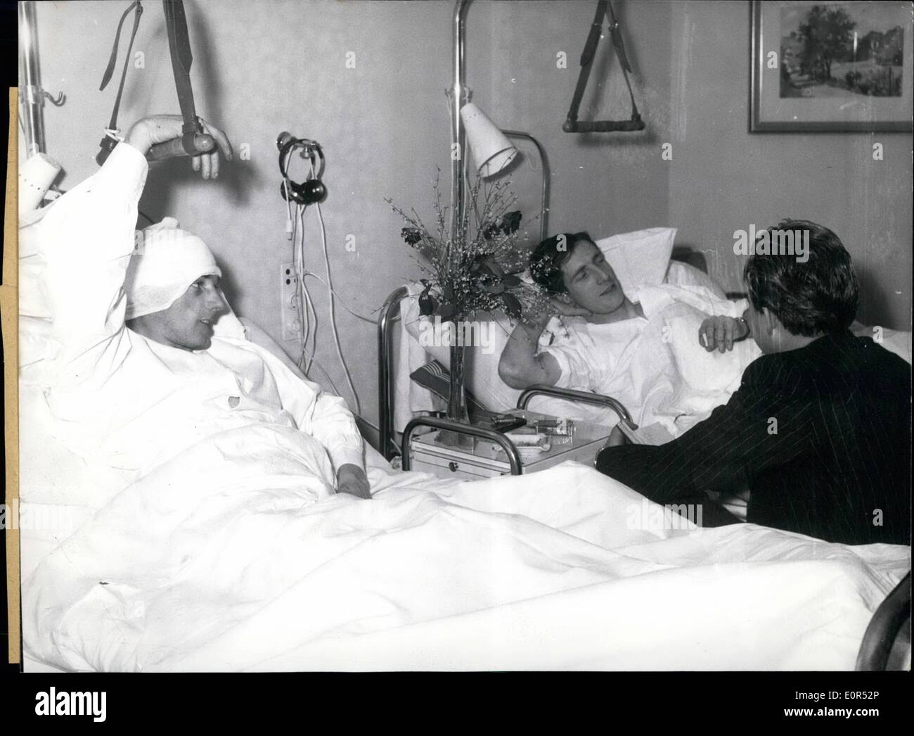 Feb. 02, 1958 - In the hospital at the right side of the Isar in Munich, several injured members of the football team Manchester United, injured at the aircraft's catastrophe at February 7, '58 in Munchen-Riem, already are on the way of recovery. OPS: Dennis Violett (left side) and Albert Scanton (right side) giving an interview to a reporter of Daily Mail. February 11, Ã¢â‚¬Ëœ58 Stock Photo