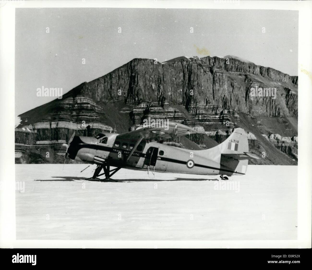 Feb. 02, 1958 - Single-Engine Aircraft Crosses Antarctic Continent: A de Havilland Otter of the British Commonwealth Trans-Antarctic Expedition has become the first single-engine aircraft to cross the ice continent. It flew last month from the expedition's base at South Ice to the Scott Base on the other side of Antartica. The United States is among the six countries who are using Canadian-built de Havilland aircraft in Antarctica during the International Geophysical Year. Photo shows The British Commonwealth de Havilland Otter with the Thoren Mountains of Antarctica in the background Stock Photo