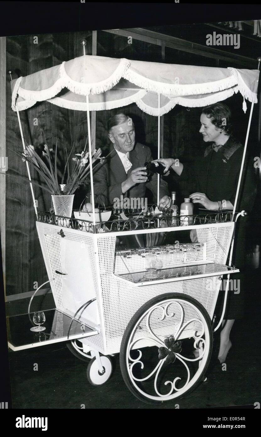 Feb. 10, 1958 - News at the Furniture -Trade-Farr in Cologne: The Furniture - Trade - Fair in Cologne shows next to used - to furniture designs also some very interesting new forms. Some of them are nothing but technical play-things with very little practical use. Photo shows Bird - cage made of glas and Perlon -rods which looks pleasantly-exotic because of the pliability of the Perlon - rods. Stock Photo