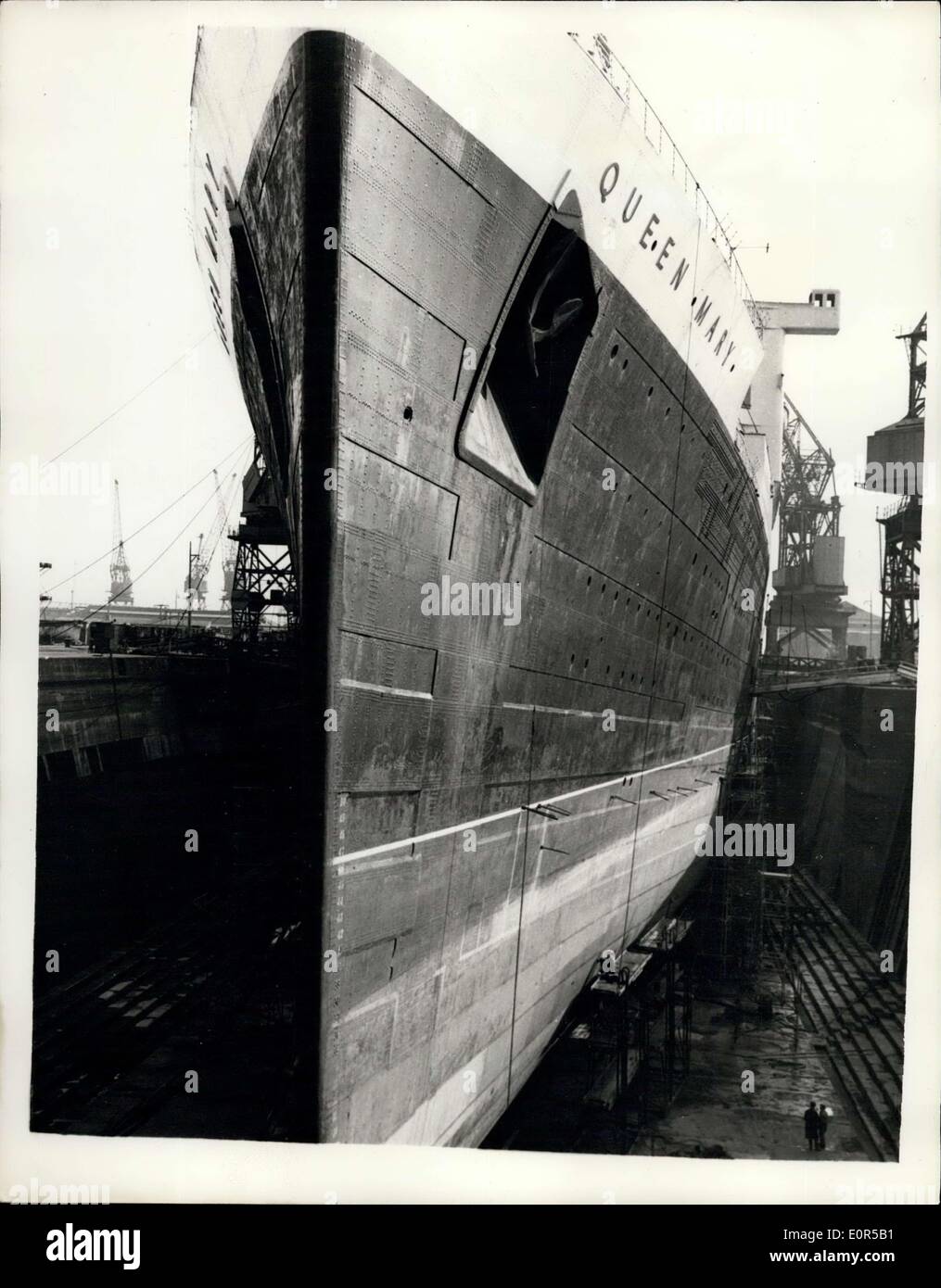 Feb. 24, 1958 - The S.S. ''Queen Mary in Dock to be fitted with ''Deiny Brown Stabilisers'': The liner S.S. Queen Mary is now in dry dock at Southampton - for the fitting of two Paris of Deiny Brown Stabilisers - to smooth out the passages from Southampton to New York. The Queen Elizabeth has already been fitted with them. Photo shows Looking at the razor-like bows of the Queen Mary in dry dock at Southampton. Stock Photo