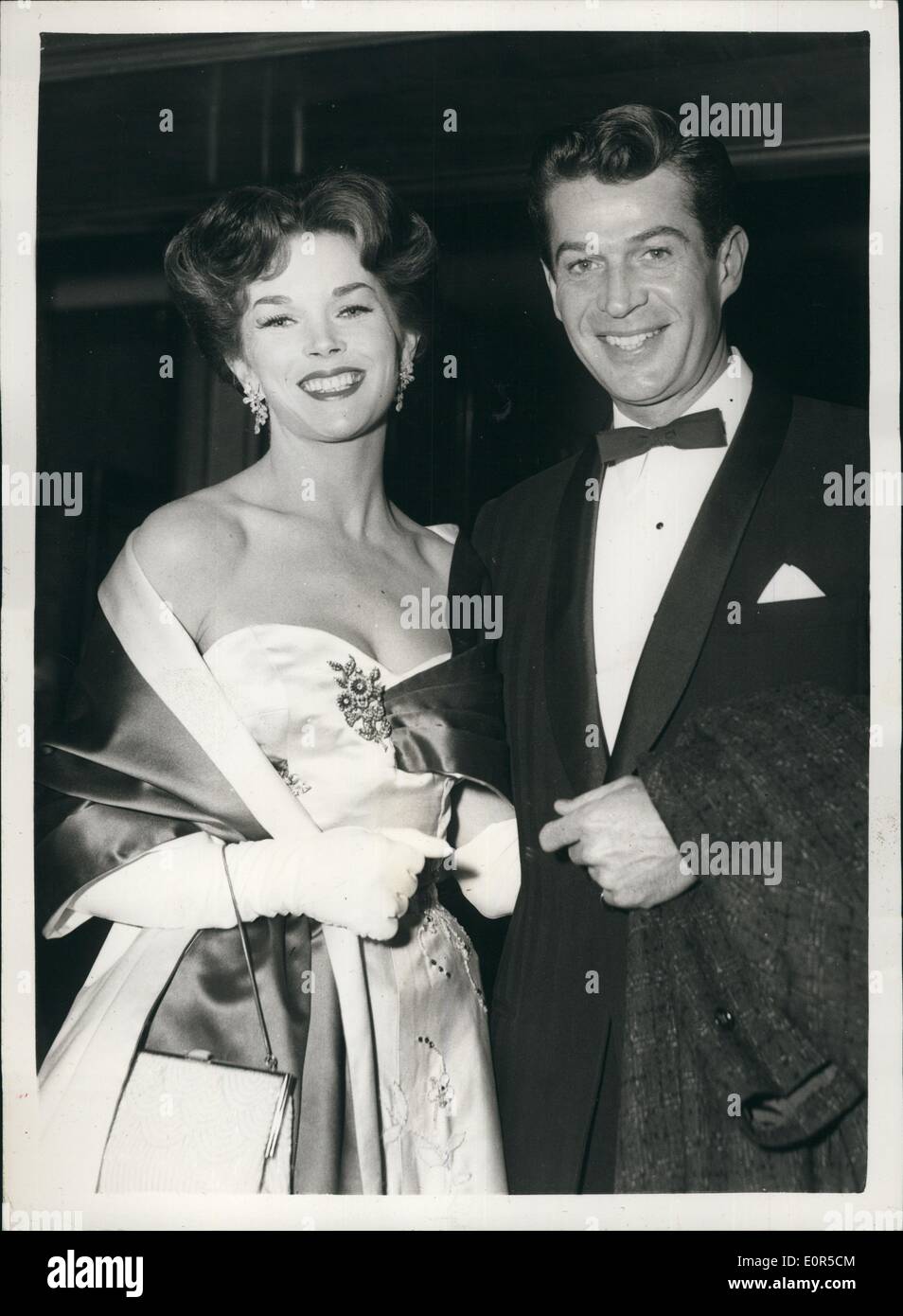 Mar. 03, 1958 - World Premiere Of ''The Silent Enemy'': The world premiere of the film ''The Silent Enemy'' - and the British Film Academy Awards Presentation, took place this evening at the Odeon, Leicester Square. Photo shows Film actress Dawn Addams, wife of Prince Vittorio Massimo, arriving at the -Odeon this evening with American actor George Nader. Stock Photo