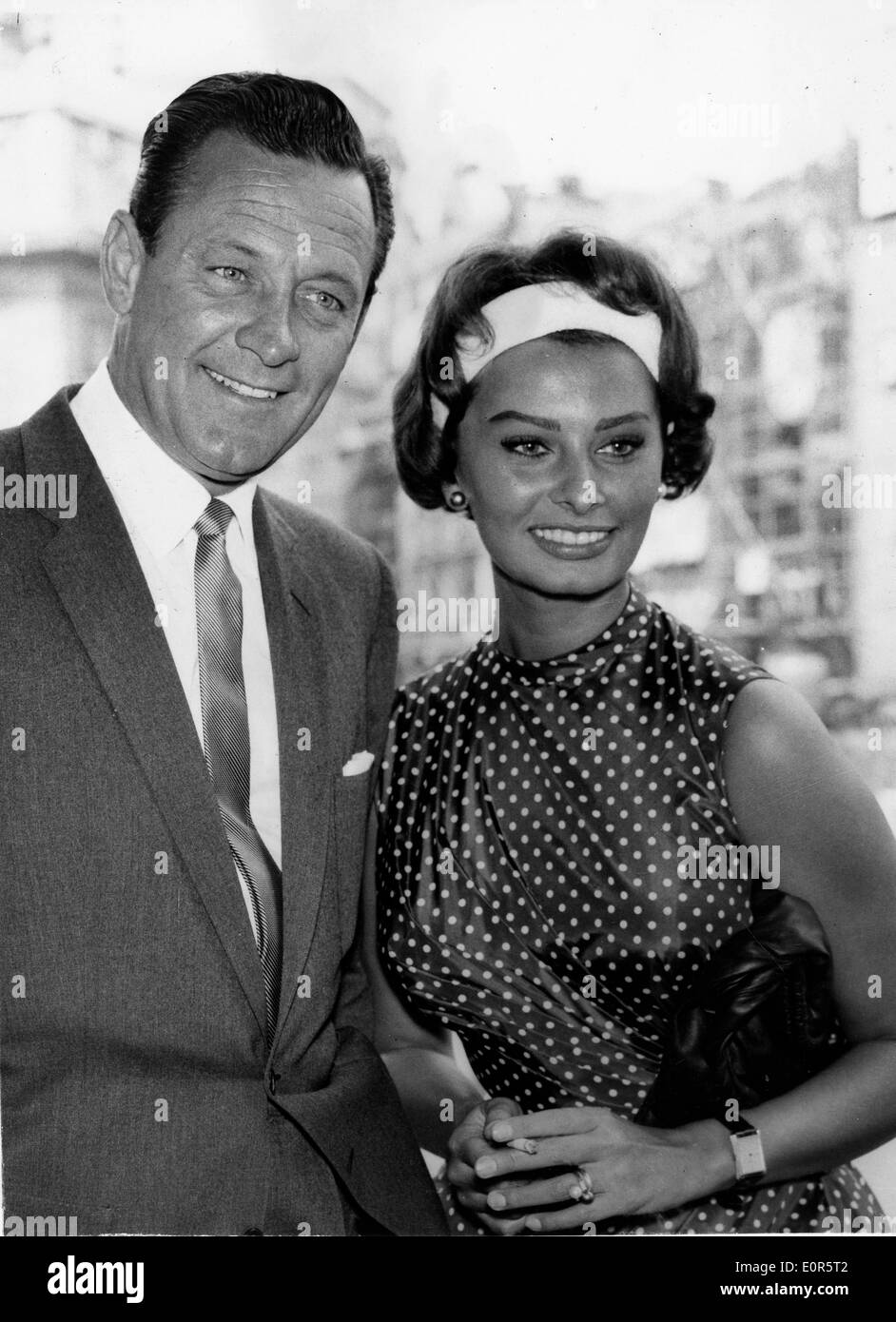 Actors Sophia Loren and William Holden at press reception for 'The Key' Stock Photo