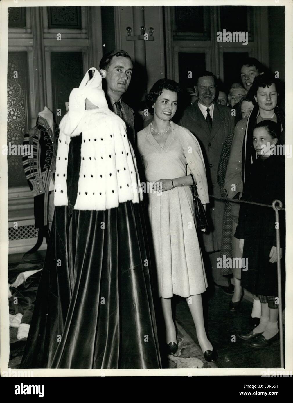 Apr. 04, 1958 - Duke of Ruthland AD His Fiancee Show - Off His Coronation Robes at Belvoir Castle - The Duke of Ruthland spent the Bank Holiday showing crowds of Sightseers round his home, Belvoir Castle, and togeather with his fiances, Miss Francis Sweeny, the 20-year old daughter of the Duchess of Argyll, they showed off his Coronation Robes. Photo Shows:- The Duke of Ruthland with his fiancee, Miss Frances Sweeny, as the show off his Coronatte Robes at his home, Belvoir Castle Yesterday. Stock Photo