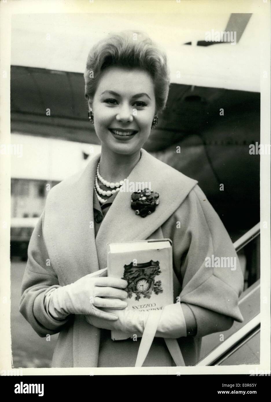 Apr. 04, 1958 - Mitzi Gaynor arrives for premiere of South Pacific . Mitzi Gaynor and husband Jack Bean, arrived at London Airport today for the premiere of Mitzi's South Pacific in London on April 21st. Keystone Photo Shows: Mitzi Gaynor pictured on arrival at London Airport today. H/Keystone Stock Photo