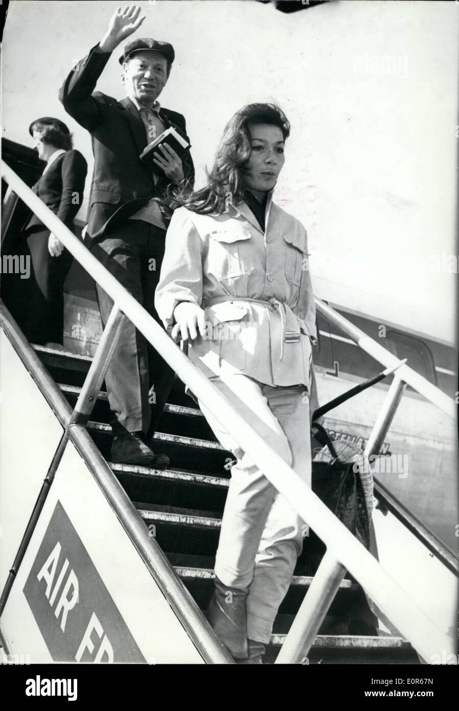 Apr. 04, 1958 - Juliette Greco: Back from Africa: Juliette Greco who is starring in ''Racines Du Ciel'' (The Roots of Heaven) just completed in Equatorial Africa arrived at Orly Airport this morning. Photo Shows Juliette going down the gangway. Stock Photo