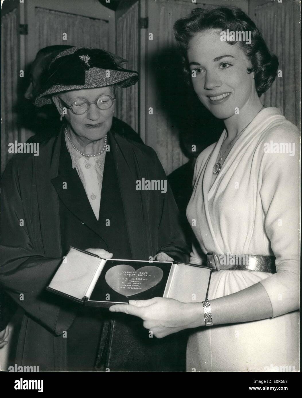 Jun. 06, 1958 - Variety Club Luncheon at Dorchester Hotel. Presentation of Silver Heart.: Guests of honour at the Variety Club of Great Britain Luncheon this afternoon. were Julia Andrews star of ''My Fair Lady'' - and Miss Blanche Patch - Secretary of the late George Bernard Shaw - author of ''Pygmalion'' on which the west End show is based. Miss Patch presented Miss Andrews with a Silver Hear as a trouble to her stage successes. Photo shows Miss Blanche Patch presents the silver heart to Miss Julie Andrews this afternoon. Stock Photo