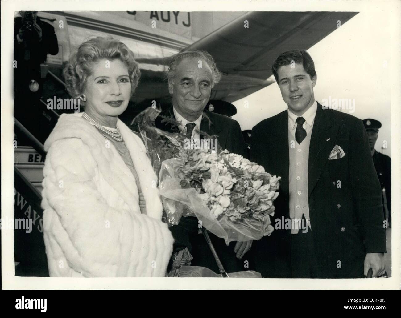 May 05, 1958 - The dockers arrive home from riviera : Sir Bernard and Lady Docker and the latter's son lance arrived at London airport this evening from the french riveirn. The dockers have been expelled from includes Cannes and nice-following an incident in which lady docker is alleged to have destroyed a Monegasque flag. photo shows Sir berlad and lady dockers and lance - on arrival at London airport Thia evening. Stock Photo