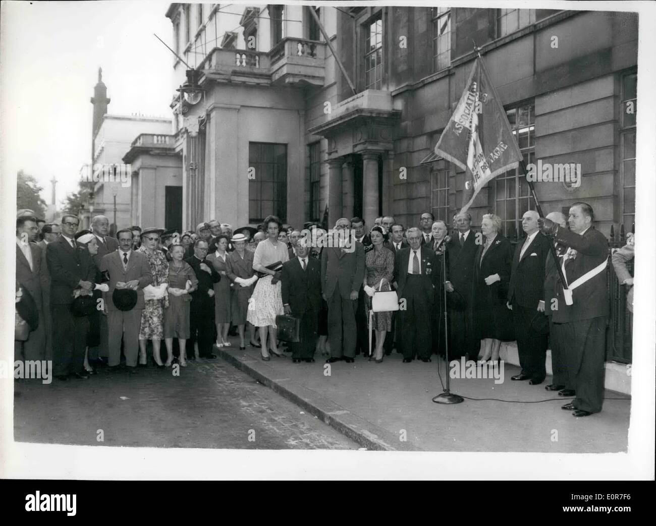Jun. 18, 1958 - 18-6-58 Ceremony at General De Gaulle's war-time headquarters in London. The annual ceremony during which the small circle of French and English who worked closely with French Resistance, listened to General De Gaulle's broadcast of June 19, 1940, took place outside the General's war-time London headquarters in Carlton Gardens, this evening. Keystone Photo Shows: General view of the gathering, which included Lady Churchill, Mr. Selwyn Lloyd and the French Ambassador, M. Chauvel, listening to a recording of General de Gaulle's speech. Stock Photo