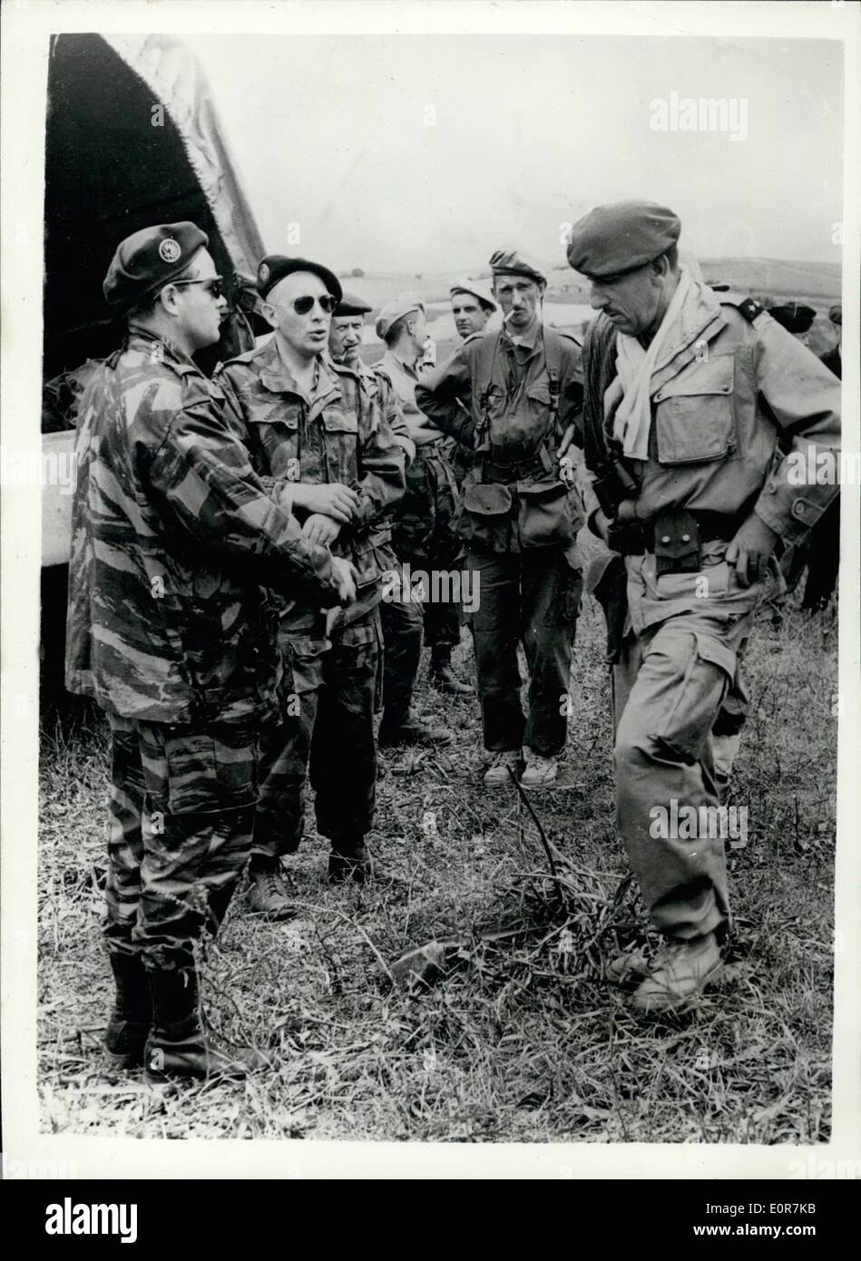 May 05, 1958 - France faces revolt in Algeria. General Massu leads paratroopers.: French settlers in Algeria last night revolted against the Paris Government. They were led by fifty year old General Macques Massu, the commander of the Algiers Region. The rebels seized Algiers radio station - and General Massu set up what he terms a '' Committee of Public Safety'' - comprising three colonels- seven civilians and himself. He also cabled President Coty to demand the setting up of a ''Government of Public Safety'' in France to ensure that Algeria remains French whatever the cost Stock Photo