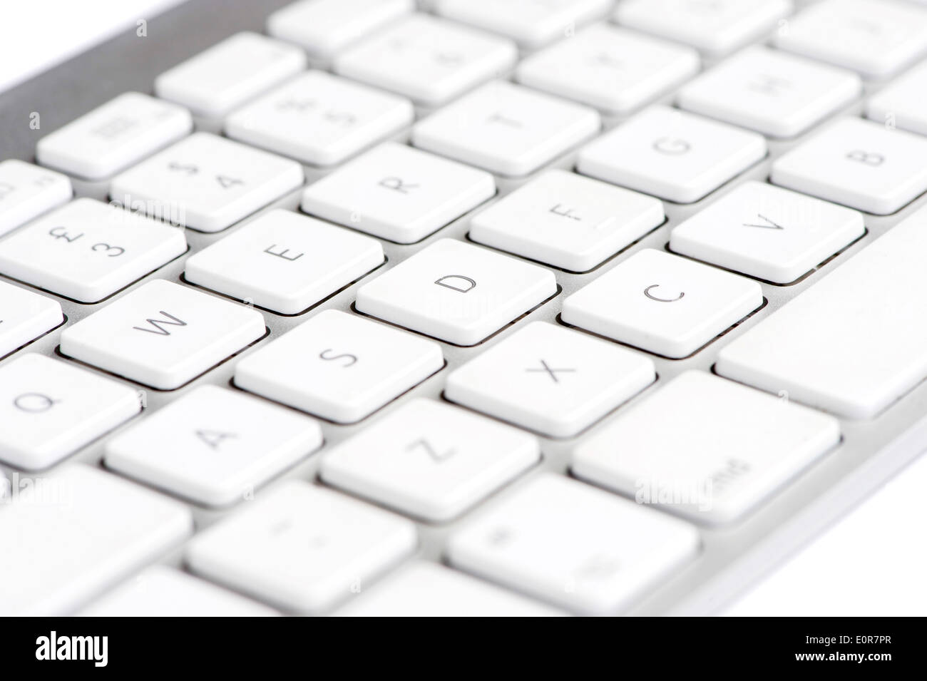 Apple mac white Keyboard focused on the letter D Stock Photo