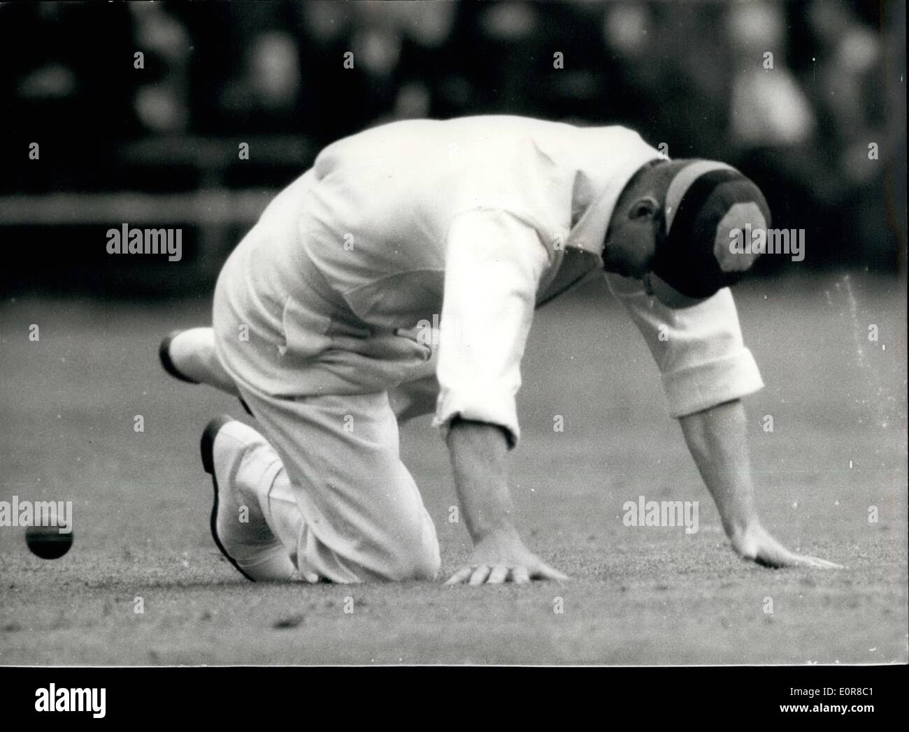 Aug. 03, 1958 - 3.8.58 Duke at cricket. The Duke of Edinburgh today captained a side against a team led by Lord Porchester, in a cricket match held in aid of the National Playing Fields Association, at Highclere Park, Hampshire. Keystone Photo Shows: The Duke of Edinburgh fails to field the ball, during the match today. Stock Photo