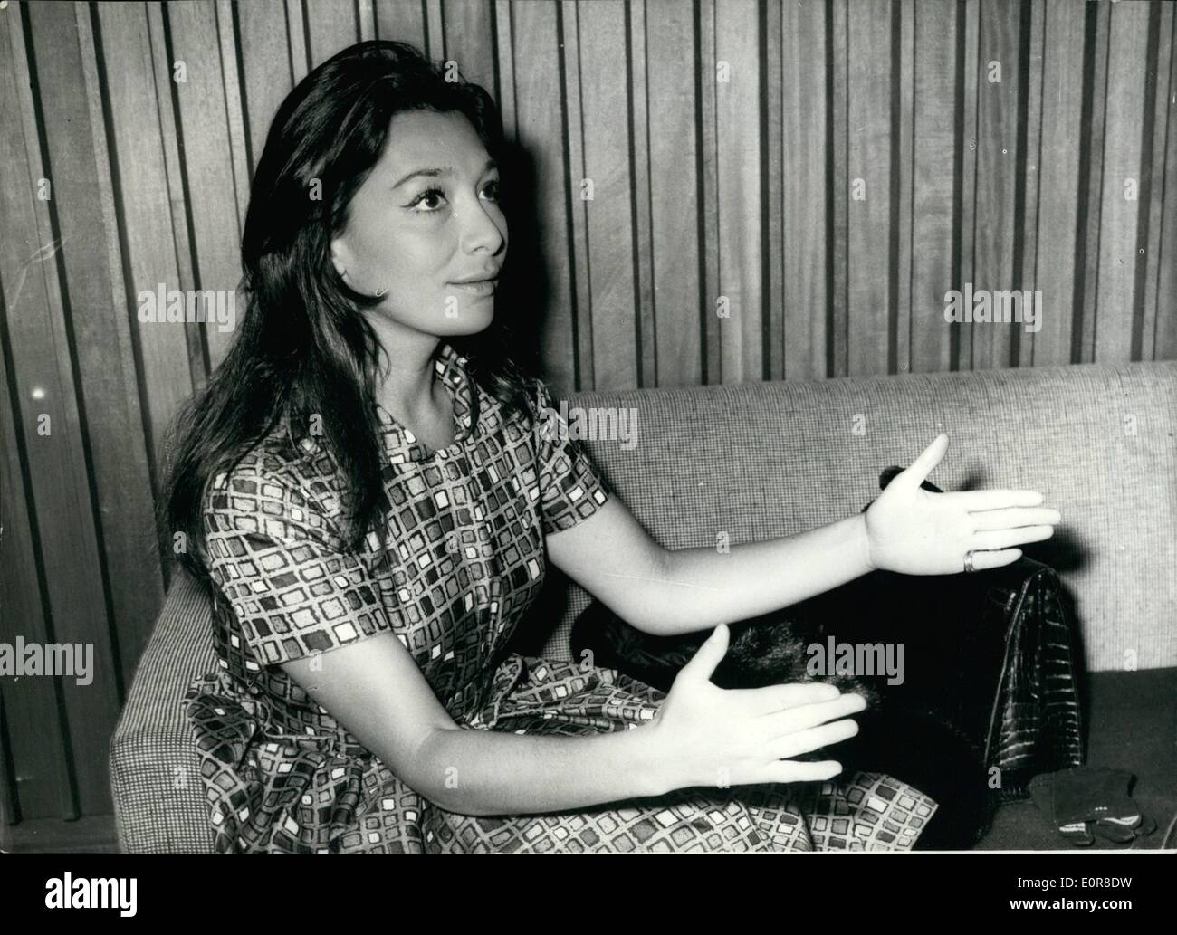 Aug. 08, 1958 - Juliette Greco flies in. Photo shows French film star Juliette Greco, pictured chatting in the lounge at London Stock Photo