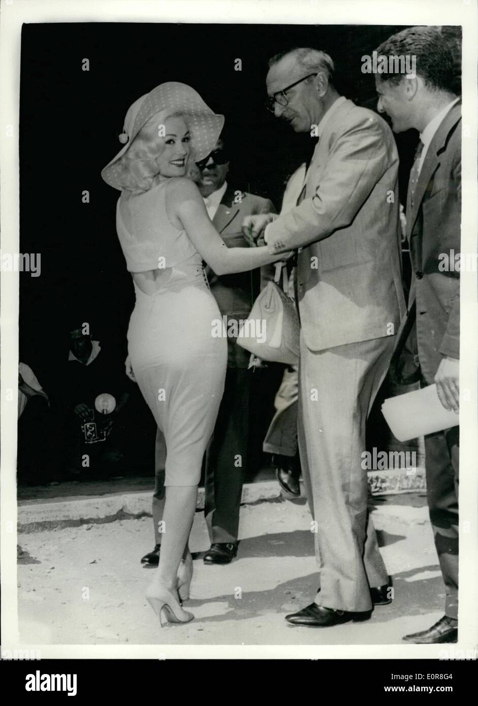 Jul. 07, 1958 - Famous Hollywood star Mamie Van Doren arrives in Rome.  Photo Shows: Mamie Van Doren seen on her arrival at Ciampino Airport  wearing a close-fitting backless dress. The famous