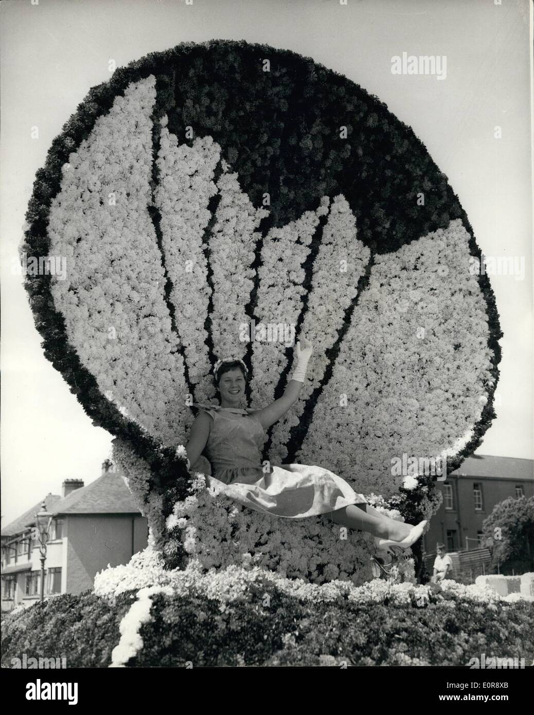 Jul. 07, 1958 - Jersey Battle Of Flowers. Photo Shows:- Margaret O'Brien Seated on one of the many floats - in the shape of a huge sea-shell, during the annual Jersey Battle of Flowers today. Stock Photo