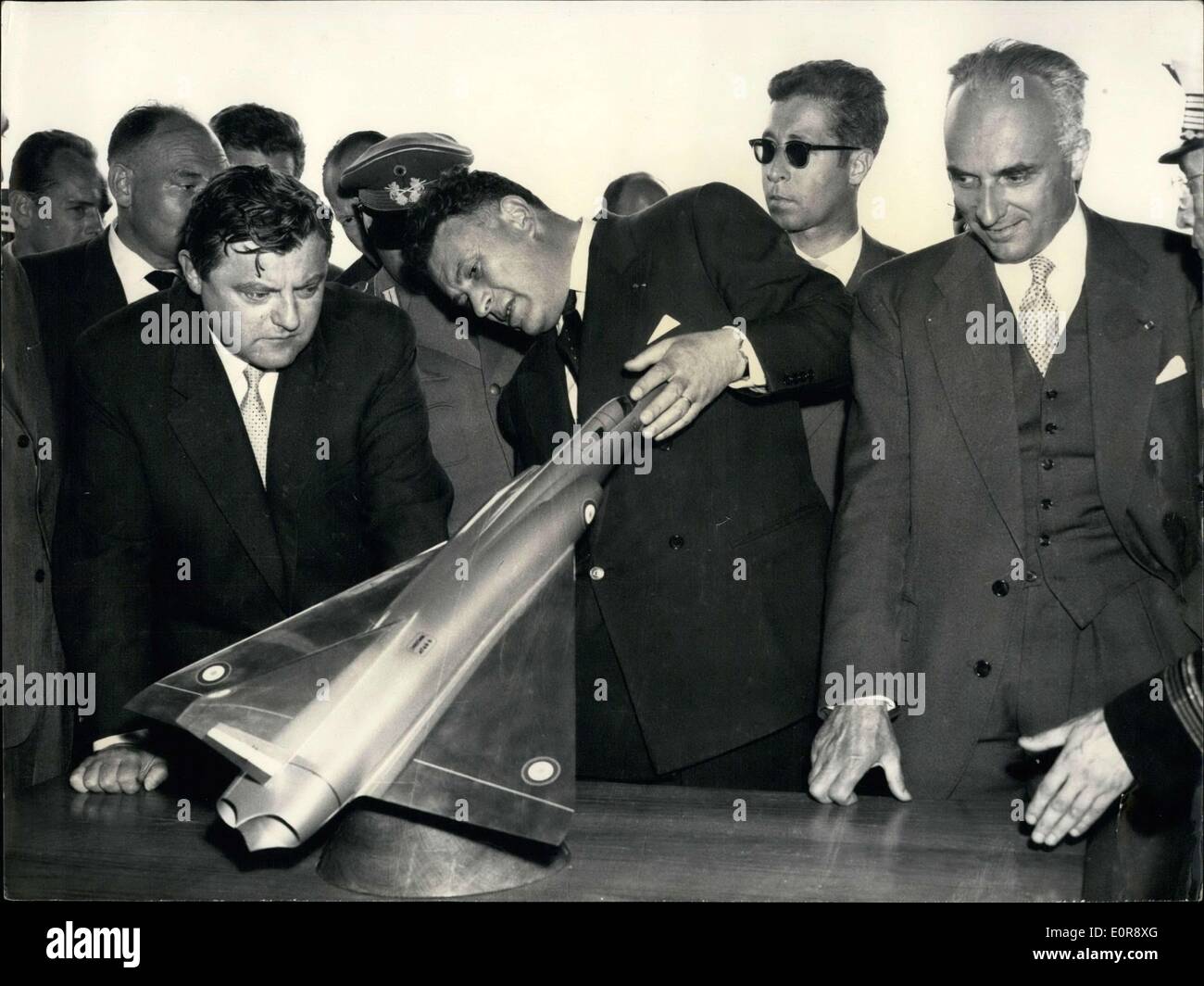 Jul. 08, 1958 - Engineer Dassault, Franz-Josef Strauss and Guillaumat in Paris . Stock Photo
