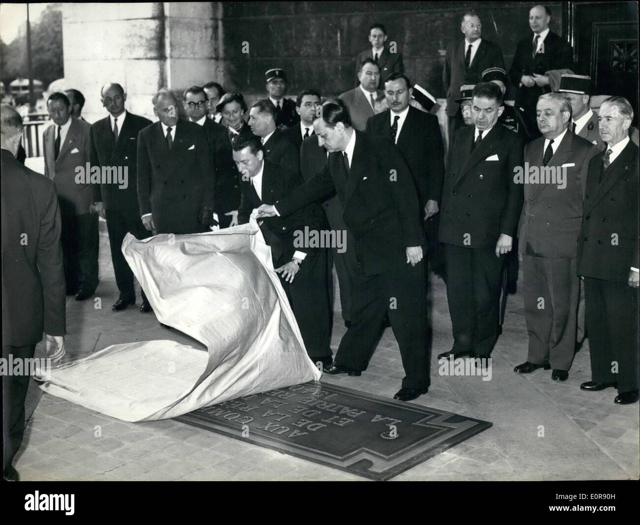 Aug. 08, 1958 - Tablet Commemorating Resistance Unveiled Under Arch of Triumph: A Tablet commemorating the resistants who sacrificed their lives for the freedom of France was unveiled under the arc detriomphe, Paris, Today. The occasion was the 14th anniversary of the Liberation. Photo Shows: Andre Malraux unveiling the tablet. Stock Photo