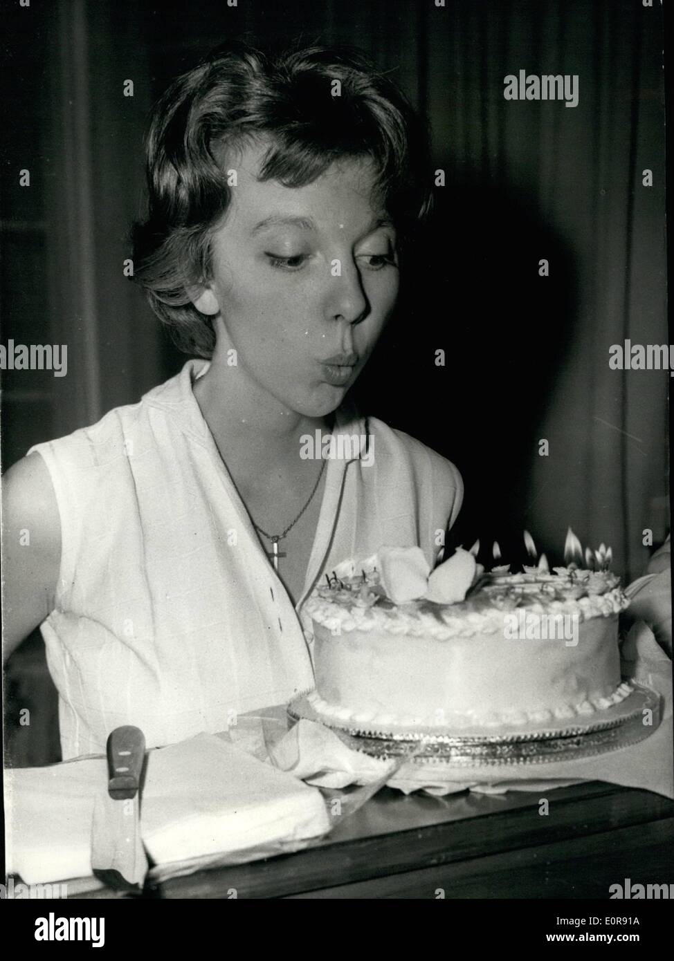 Aug. 08, 1958 - Anna Massey Celebrates Her Twenty-First Birthday Surprise Cake: A Celebration was held between rehearsals on the stage Criterion Theatre this afternoon - for the 21st. birthday of Anna Massey the star f the show - ''The Elder Statesman''. As a surprise she was presented with a birthday cake - by Henry Sherek - who present the play. Photo Shows Anna Massey bl;ow out the candles of her surprise birthday cake this afternoon. Stock Photo