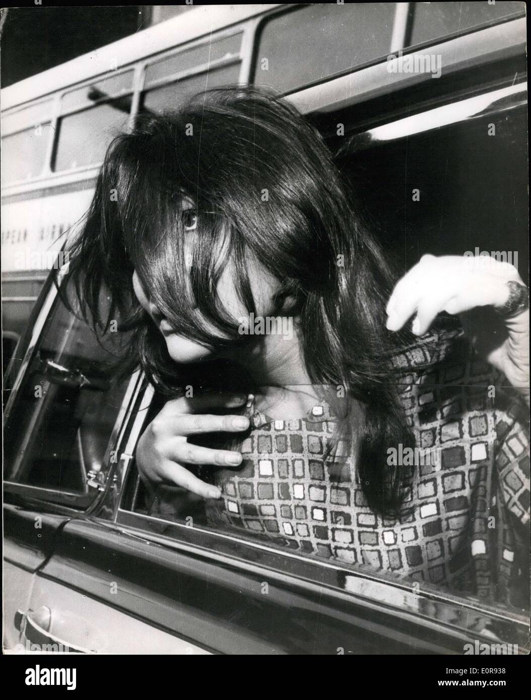 Aug. 15, 1958 - The French Film Star - with Untidy Hair. Juliette Grecro in London: Among the arrivals in London yesterday was French Film star Juliette Greco for preparations for the filming of Whirlpool which stars on Location in Germany next month. Photo shows Juliette Greco with her hair untidily over her face on arrival in London yesterday. Stock Photo