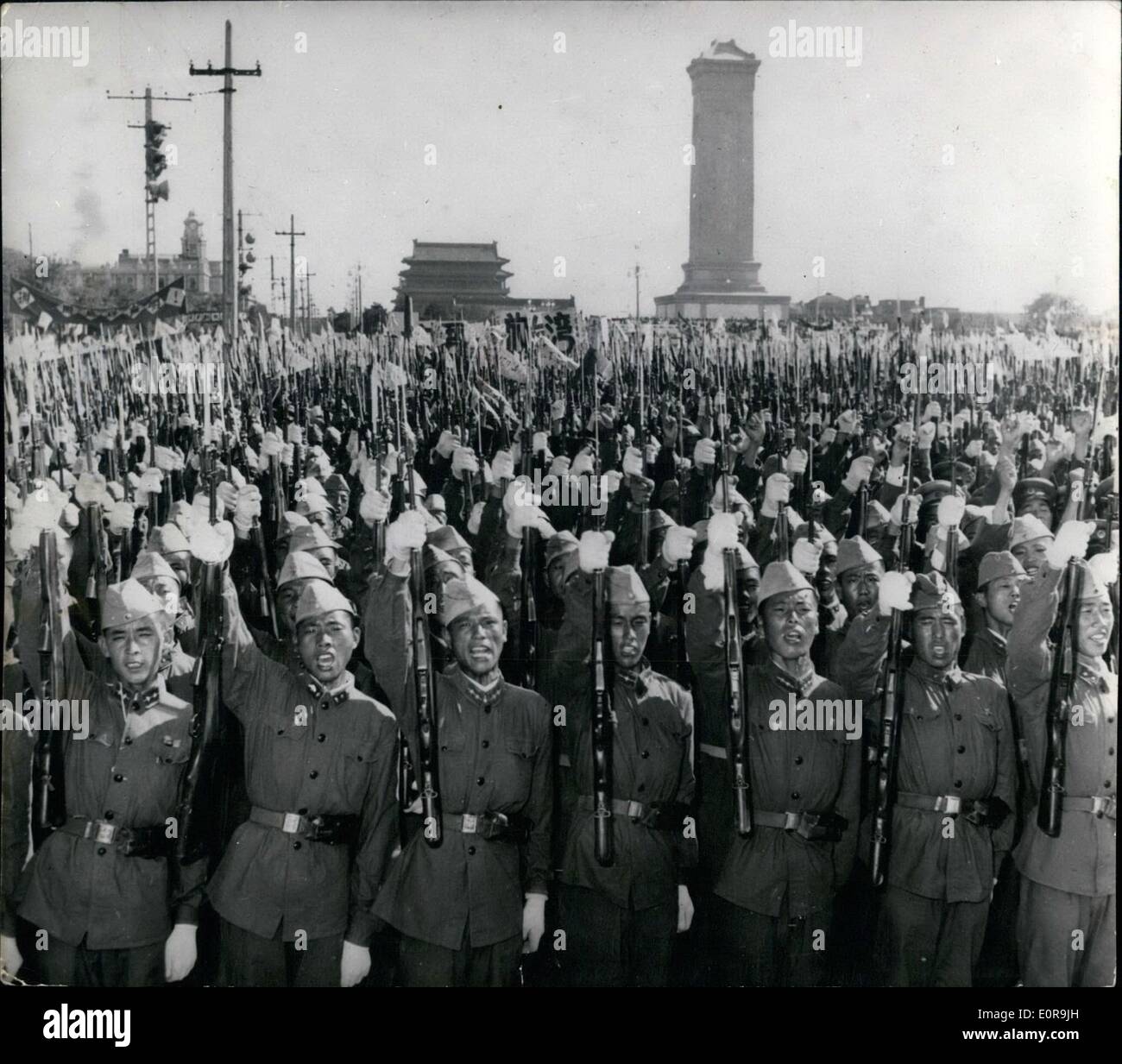 Sep. 09, 1958 - Peking mass rally supports premier Chou's statement. Peking people held a mass rally and demonstration on St. 6. to support Premier Chou En-Lai's statement on the situation in the Formosa straits are and oppose the U.S. ''aggression''. OPS: Chinese People's Liberation Armymen shouting the slogans ''We must liberate Quemoy and Matsu''. ''We must liberate Taiwan' Stock Photo