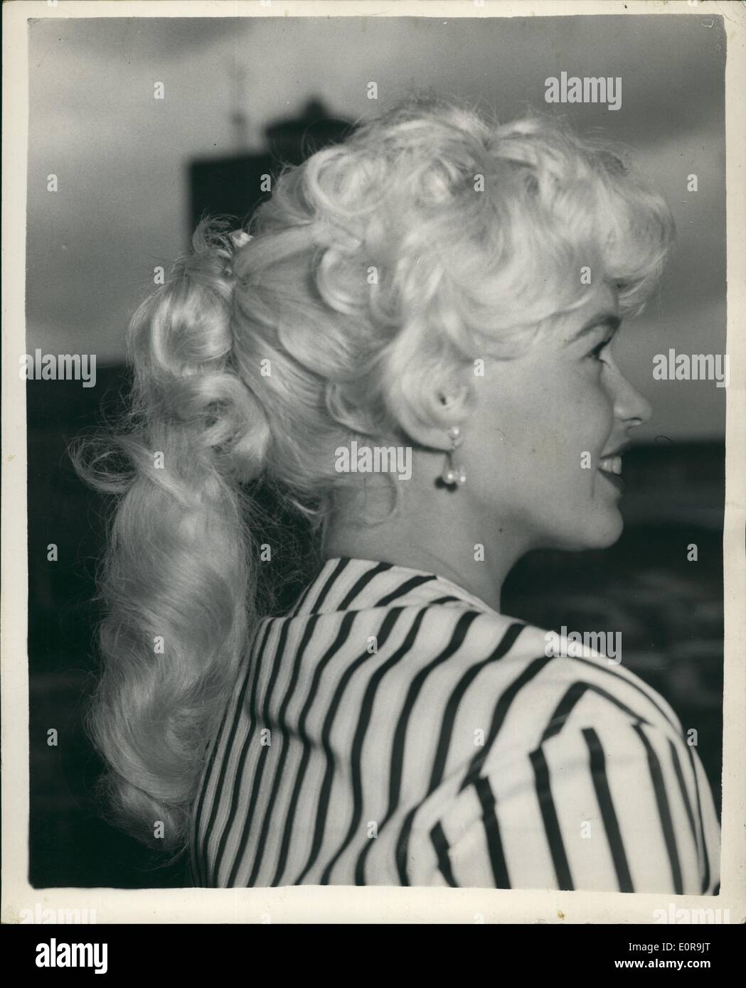 Sep. 09, 1958 - Jayne field Aid Husband Fly To Gaines Film Festival : Leaving London by air today was American film star Jayne Stock Photo