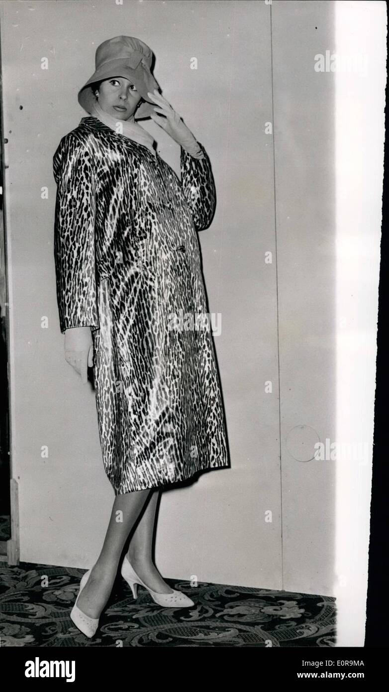 Sep. 09, 1958 - Autumn Fashions On Show In London. Photo shows Audrey Blakey wears a leopard pattern nylon raincoat with a stitched slouch hat at the display of autumn styles organized by Simpsons of Piccadilly - at the Grosvenor House, this morning. Stock Photo