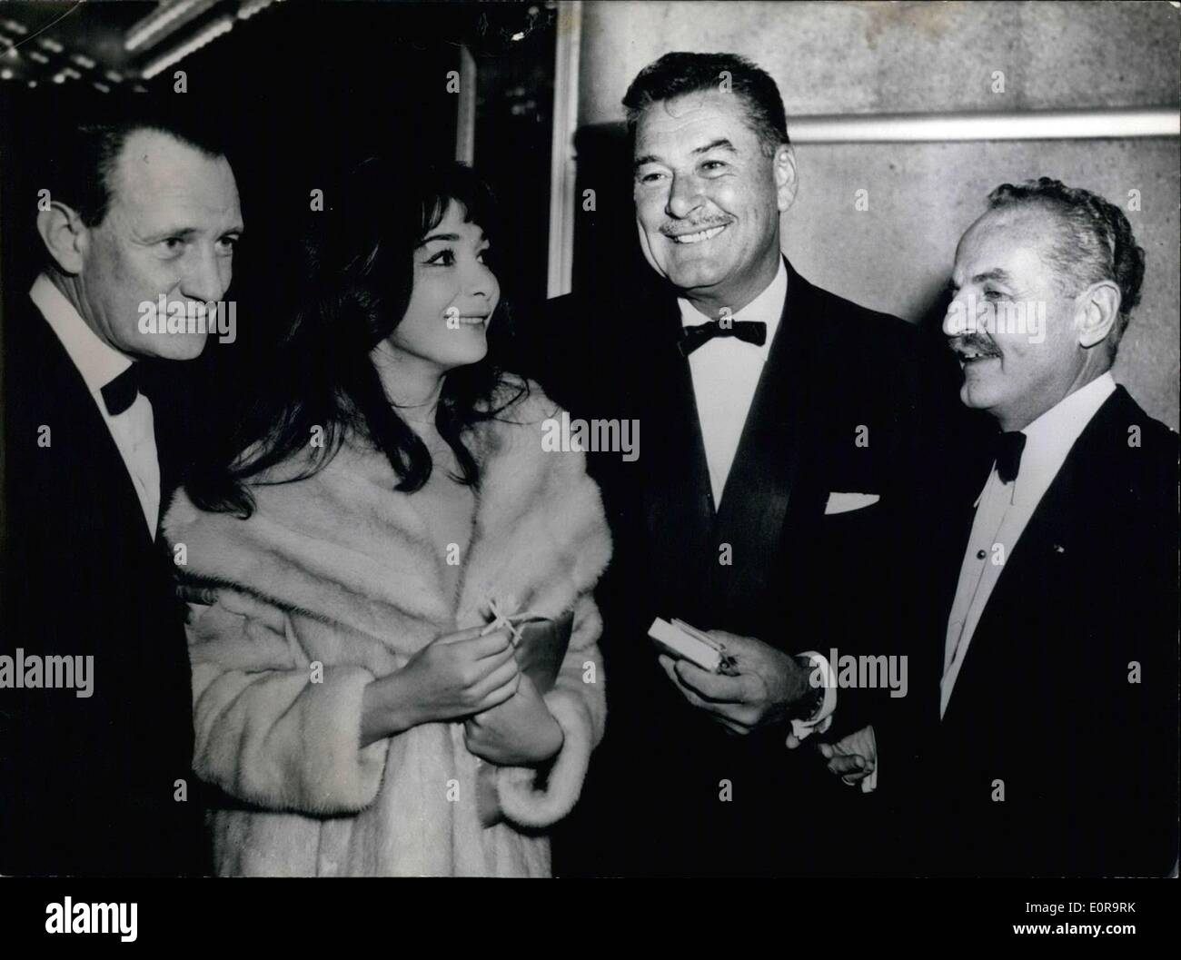 Oct. 18, 1958 - Film premiere in New York. All the main cast of the Daryl F. Zanuck film ''The Roots of Heaven'' came to the premiere on Broadway in New York. Pictured from left to right: Trevor Howard, Juliette Greco, Errol Flynn, and producer Daryl F. Zanuck. Stock Photo