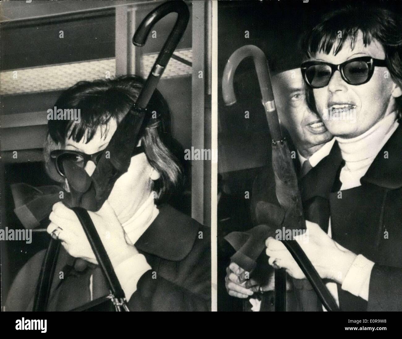 Oct. 30, 1958 - Pictured are Greta Garbo(hidden behind sunglasses) and  George Schlee upon their return to New York after a long Stock Photo - Alamy